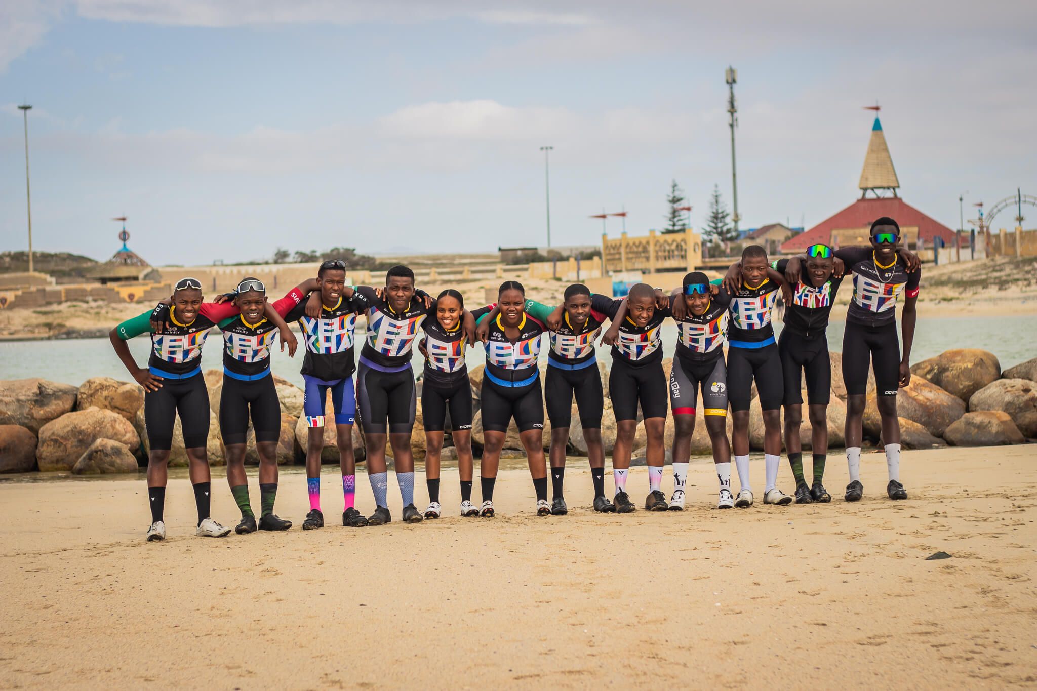 Velokhaya cycling team standing together in team kit